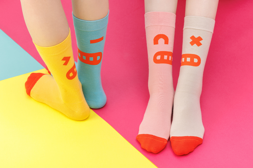 Four different sock designs symbolised the uniqueness of every individual.